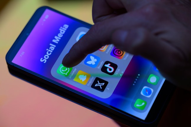 Social media icon applications, including WhatsApp, appear on a mobile phone in this photo illustration in Brussels, Belgium, on March 16, 2025. (Photo by Jonathan Raa/NurPhoto via Getty Images)