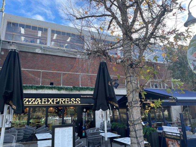 Bizarre mural ripped down after dozens of shoppers complained about it The massive display, which has appeared above the C?te Brasserie restaurant and others on Rivrside Walk, Kingston, was taken down at 6am on Thursday following dozens of complaints. Among the surreal images depicted a dog with a bird's head wading through partially frozen water.