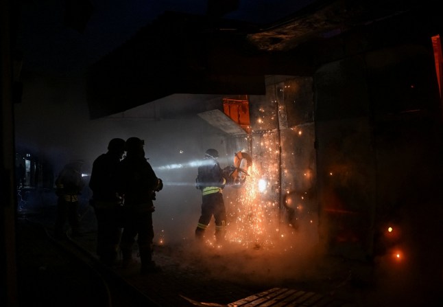 Firefighters work at the site of the Russian air strike, amid Russia's attack on Ukraine, in Zaporizhzhia, Ukraine November 20, 2025. REUTERS/Stringer