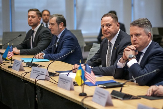 Ukraine's Presidential Office Chief of staff Andriy Yermak (2nd R) looks on as he faces US Secretary of State and US special envoy during discussions on a US plan to end the war in Ukraine at the US Mission in Geneva, on November 23, 2025. US Secretary of State Marco Rubio arrived in Geneva on November 23, 2025 morning for discussions on a US plan to end the Ukraine war, after Washington signalled room for negotiation on the controversial proposal. Ukrainian, European and Canadian officials were also gathering in the Swiss city. (Photo by Fabrice COFFRINI / AFP via Getty Images)
