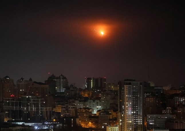 An explosion of a Russian drone in the sky over the city during a Russian missile and drone strike, amid Russia's attack on Ukraine, in Kyiv, Ukraine November 25, 2025. REUTERS/Gleb Garanich