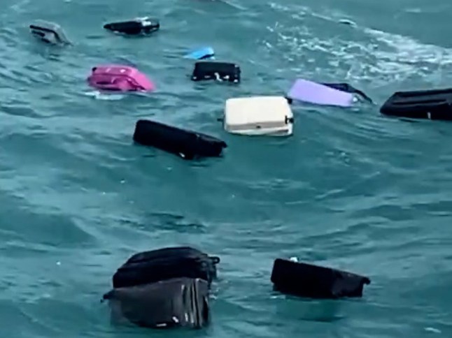 Alice Zamparelli, an Australian tourist in Thailand, captured the moment that dozens of passengers' suitcases floated out to sea during a boat trip