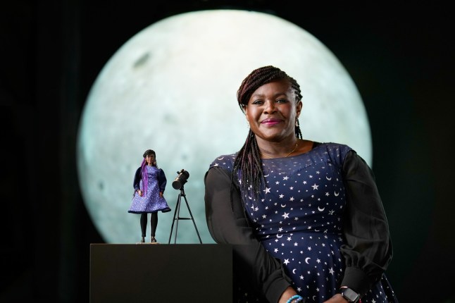 Undated handout photo issued by Mattel of British scientist Dr Maggie Aderin-Pocock MBE, a British space scientist, Barbie has honoured the scientist with a one-of-a-kind doll in her likeness in celebration of both International Women's Day and British Science Week. Issue date: Tuesday March 7, 2023. PA Photo. Dr Maggie Aderin-Pocock MBE, a black British female scientist best known for presenting BBC One's The Sky at Night, is a 'Barbie Role Model' and has been recognised for her achievements in making space and science accessible to young girls. Her doll features a starry dress and comes with a telescope accessory, a nod to Dr Aderin-Pocock's work with the James Webb telescope. See PA story SOCIAL Barbie. Photo credit should read: Mattel/PA Wire NOTE TO EDITORS: This handout photo may only be used in for editorial reporting purposes for the contemporaneous illustration of events, things or the people in the image or facts mentioned in the caption. Reuse of the picture may require further permission from the copyright holder.