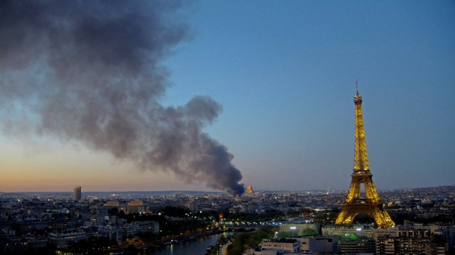 Smoke rises over Parisian skyline, as fire erupts at a waste disposal centre at Boulevard de Douaumont, according to the Paris fire department, in this screengrab taken from a video, in Paris, France, April 7, 2025. Reuters TV/via REUTERS TPX IMAGES OF THE DAY