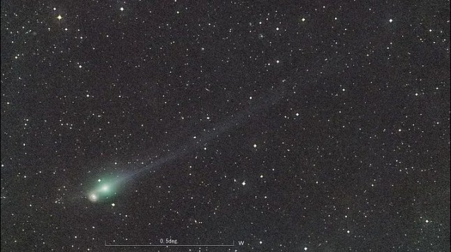 An image of 3I/ATLAS, taken on November 22, 2025 at 19:25 UTC with a 0.5-meter telescope. At that time, 3I/ATLAS was close in projection to the galaxy NGC4454 in the sky. The sunward direction is towards the lower left corner. (Credit: Mitsunori Tsumura)