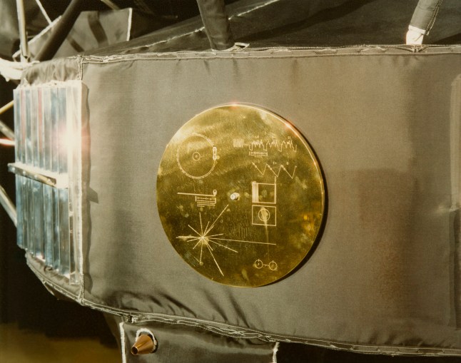 A gold record in its cover, attached to a Voyager space probe, USA, circa 1977. Voyager 1 and its identical sister craft Voyager 2 were launched in 1977 to study the outer Solar System and eventually interstellar space. The record, entitled 'The Sounds Of Earth' contains a selection of recordings of life and culture on Earth. The cover contains instructions for any extraterrestrial being wishing to play the record. (Photo by Space Frontiers/Archive Photos/Getty Images)