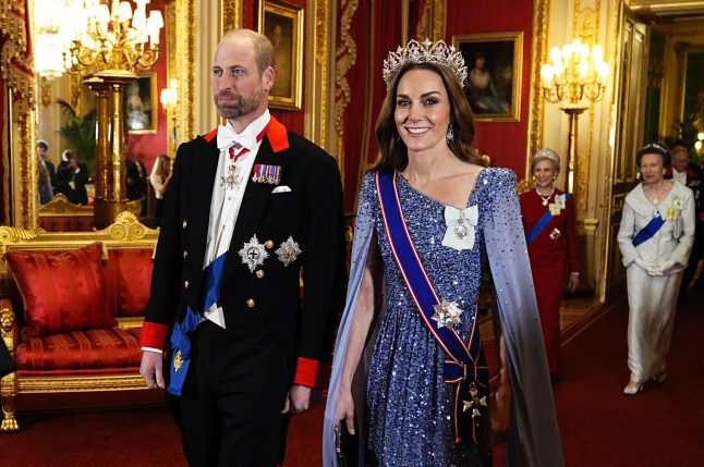 Britain's Prince William and Britain's Kate, Princess of Wales, ahead of the state banquet for the German President and his wife, at Windsor Castle, Berkshire, England, Wednesday, Dec. 3, 2025. (Aaron Chown/PA via AP, Pool)