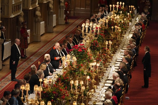 WINDSOR, ENGLAND - DECEMBER 03: King Charles III gives a speech during the state banquet for the German President Frank-Walter Steinmeier and his wife Elke Budenbender, at Windsor Castle, on December 3, 2025 in Windsor, England. The President of the Federal Republic of Germany, accompanied by Ms. Elke B??denbender, are paying a State Visit to the United Kingdom as the guests of Their Majesties The King and Queen. The visit is the first from Germany in 27 years and will be marked with ceremonial visits, an address to the UK parliament and a banquet. (Photo by Aaron Chown - Pool/Getty Images)