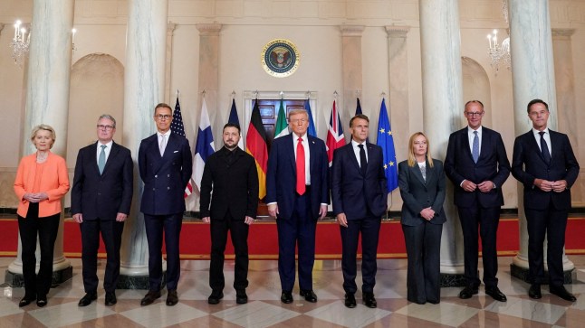 FILE PHOTO: U.S. President Donald Trump, Ukrainian President Volodymyr Zelenskiy, German Chancellor Friedrich Merz, French President Emmanuel Macron, British Prime Minister Keir Starmer, Italian Prime Minister Giorgia Meloni, and Finland's President Alexander Stubb, NATO Secretary General Mark Rutte and European Commission President Ursula von der Leyen pose for a family photo amid negotiations to end the Russian war in Ukraine, at the White House in Washington, D.C., U.S., August 18, 2025. REUTERS/Alexander Drago/File Photo