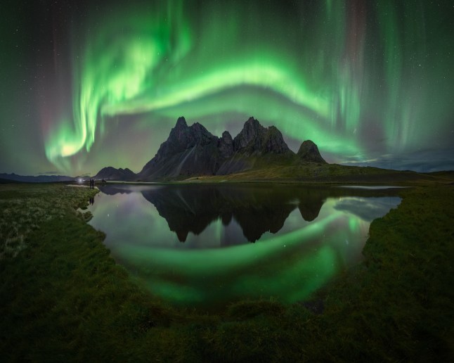 Northern Lights photographer of the year 2025 T&Cs MUST CREDIT PHOTOGRAPHER AND @capturetheatlas FOR SOCIAL MEDIA SHARING. ?Sue?os en Eystrahorn? by Pablo Ruiz . Without a doubt, one of the most challenging aurora panoramas I???ve ever taken was this one at one of Iceland???s most spectacular locations. Capturing a panorama with reflections and auroras that move so quickly is quite difficult. It was the photograph of my dreams, so I arrived in the afternoon to prepare the angles and options for the night. Clear skies and very little wind looked perfect for capturing reflections in the different pools. Auroras were already visible in the sky during the blue hour, so I quickly headed to the spot where I had planned the composition. The wind shifted, making it difficult to capture the reflections, but the moment the sky exploded, the wind stopped, and for a few brief moments, I achieved my dream photograph. It was a great joy to witness and capture such a moment.