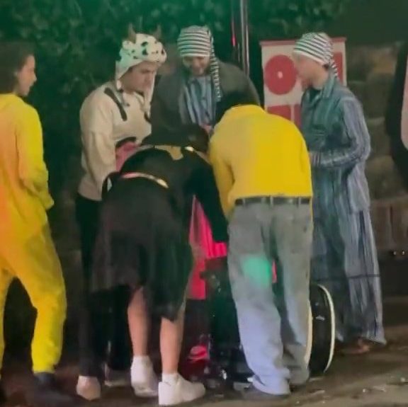 Drunk students attack Uber Eats robot