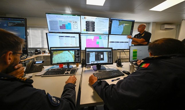 SETUBAL, PORTUGAL - SEPTEMBER 23: Visiting journalists are briefed at the control room during Media Day at REPMUS/DYMS25, NATO???s major innovation exercise, showcasing maritime unmanned systems in action, on September 23, 2025 in Setubal, Portugal. The REPMUS exercise (Robotic Experimentation and Prototyping Augmented by Maritime Unmanned Systems) is Portuguese-led and the world???s largest operational experimentation event focused on unmanned systems. Dynamic Messenger (DYMS) is part of NATO???s Operational Experimentation (OPEX) exercise series. Led by Allied Maritime Command (MARCOM), Dynamic Messenger provides a real-world environment to test and evaluate new maritime capabilities and technologies. It supports NATO???s ongoing efforts to modernize its maritime forces and maintain an operational edge. The two exercises are combined this year into one consolidated exercise. By combining the REPMUS series with the operational environment of DYMS, REPMUS/DYMS25 will not only reinforce the core objectives of both exercises but also offer NATO, its allies, and partners a unique opportunity to explore cutting-edge developments in sea robotics. REPMUS/DYMS 25 got the participation of over 2,000 participants, 19 ships, and around 260 uncrewed systems, including cutting-edge and disruptive technologies from 22 participating nations. An additional 13 countries will join as observers, benefiting from insights and collaboration in this unique operational experimentation setting. (Photo by Horacio Villalobos#Corbis/Getty Images)