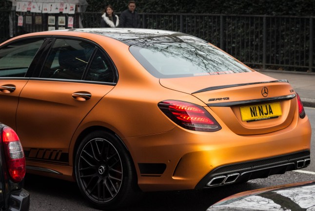 LONDON, ENGLAND - DECEMBER 18, 2016: A Mercedes Benz AMG C class with custom "NINJA" number plates in traffic.; Shutterstock ID 560285950; purchase_order: -; job: -; client: -; other: