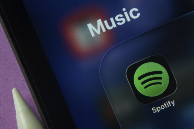 Close-up of Spotify app icons on a iPad screen