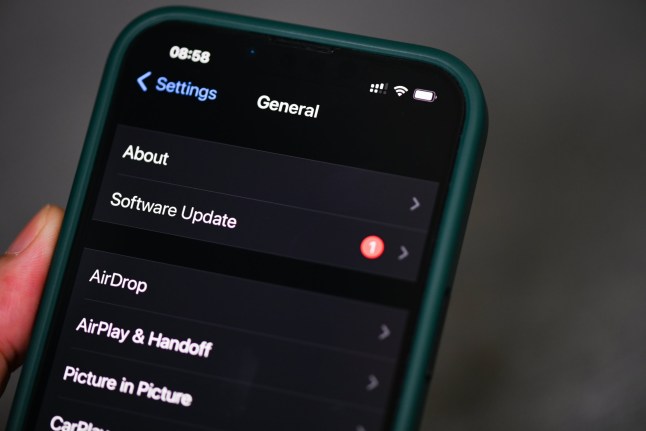 iPhone 13 Pro with notification software update iOS 15.5 on the screen close up, new operating system 2022 on iPhone apple devices for download updates : Bangkok, Thailand - May 29 202; Shutterstock ID 2161596381; purchase_order: -; job: -; client: -; other: