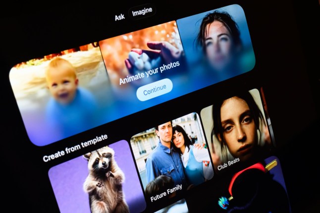A screen displays examples of AI prompt-created videos, made with Xai's Grok app, on January 12, 2026 in London, England. (Photo by Leon Neal/Getty Images)