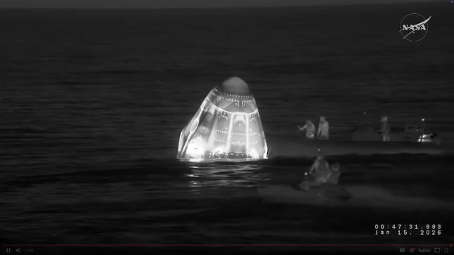 This screengrab from video provided by NASA shows recovery vessels approaching the NASA's SpaceX Crew-11 capsule to evacuate one of the crew members after they re-entered the earth in a middle-of-the-night splashdown near San Diego, Calif., Thursday, Jan. 15, 2026. (NASA via AP)